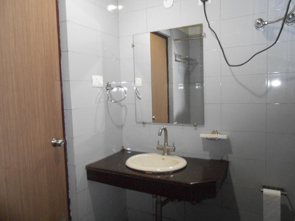 غاواهاتي Hotel Fame City الغرفة الصورة